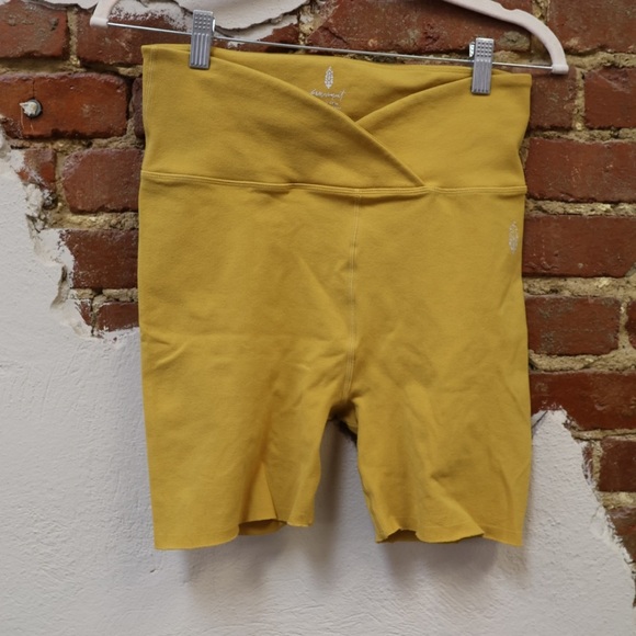 Free People Blaze It Crossover Bike Shorts in Tumeric Yellow Gold - Picture 2 of 5